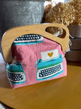 Load image into Gallery viewer, Wooden Handle Clutch in Pink Typewriter print canvas