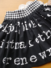Load image into Gallery viewer, Hazel Skirt Size 5 Black and White lettering print