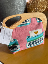 Load image into Gallery viewer, Wooden Handle Clutch in Pink Typewriter print canvas
