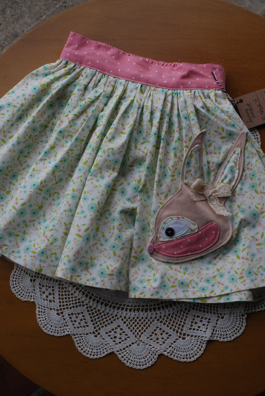 Hazel Skirt Size 4 Floral print with detailed Bunny front pocket